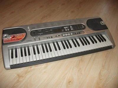 Лот: 2837696. Фото: 1. Синтезатор CASIO LK-70S. Клавишные