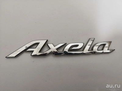 Лот: 13480226. Фото: 1. Эмблема багажника Mazda Axela... Другое (автозапчасти)