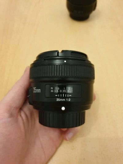 Лот: 15504458. Фото: 1. Объектив YongNuo AF 35mm f/2 для... Объективы