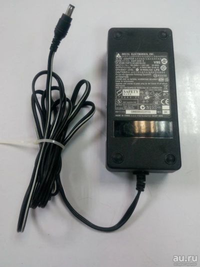Лот: 8613361. Фото: 1. Блок питания Delta Electronics... Зарядные устройства, блоки питания для бытовой техники