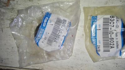 Лот: 7476500. Фото: 1. Сальник распредвала mazda BP01-10-602A. Двигатель и элементы двигателя