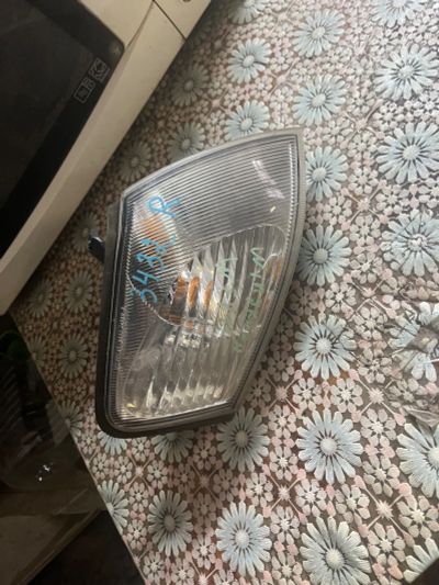 Лот: 25084667. Фото: 1. Поворотник Nissan wingroad WFY11... Другое (автозапчасти)