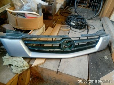 Лот: 11776008. Фото: 1. Решотка мазда демио mazda demio. Кузов