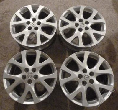 Лот: 1056783. Фото: 1. Оригинальные литые диски Mazda... Диски