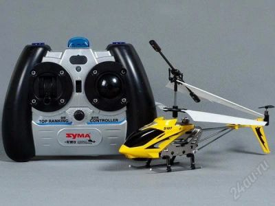 Лот: 1264553. Фото: 1. Вертолет на управлении Syma S107... Машины и техника