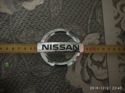 Лот: 12831905. Фото: 1. Шильдик Nissan. Кузов