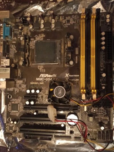 Лот: 19641396. Фото: 1. Asrock N68C-GS4 FX. Материнские платы