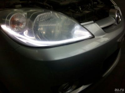 Лот: 9483409. Фото: 1. Фары на Mazda Demio 2006г. Оптика и освещение