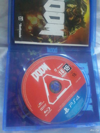 Лот: 10104553. Фото: 1. DOOM PS4. Игры для консолей