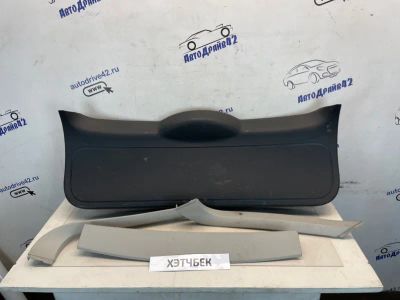 Лот: 23246451. Фото: 1. обшивка двери багажника Ford Focus... Двигатель и элементы двигателя