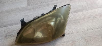 Лот: 25510460. Фото: 1. Фары Toyota Corolla Runx. Оптика и освещение
