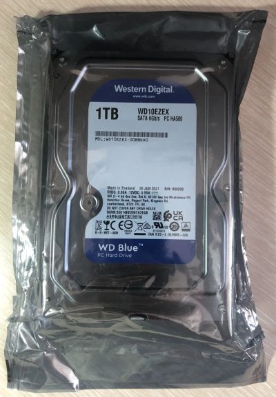 Лот: 21059353. Фото: 1. Жесткий диск 1 ТБ WD Blue [WD10EZEX... Жёсткие диски (HDD)