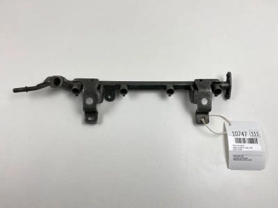 Лот: 20377085. Фото: 1. Рейка топливная Mazda 323 1998... Топливная система