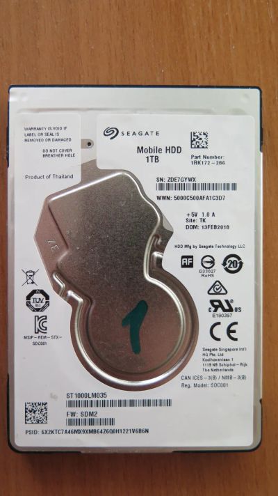 Лот: 25107890. Фото: 1. Жесткий диск Seagate ST1000LM035... Жёсткие диски (HDD)