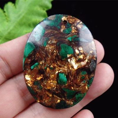 Лот: 7947833. Фото: 1. пирит+малахит кулон бусина 45x35x7mm. Драгоценные и поделочные камни