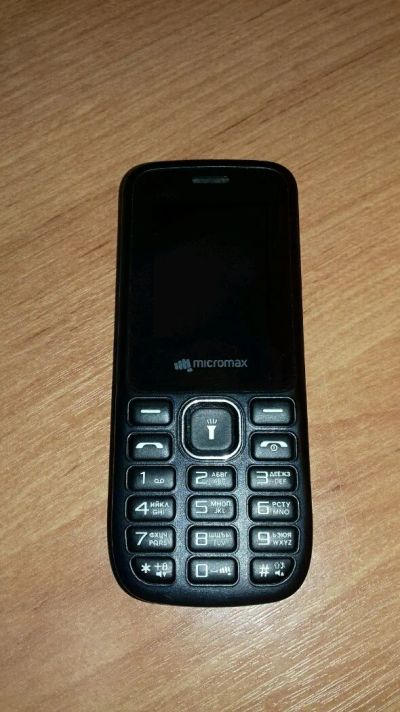 Лот: 11042869. Фото: 1. Мобильный телефон Micromax X406... Кнопочные мобильные телефоны