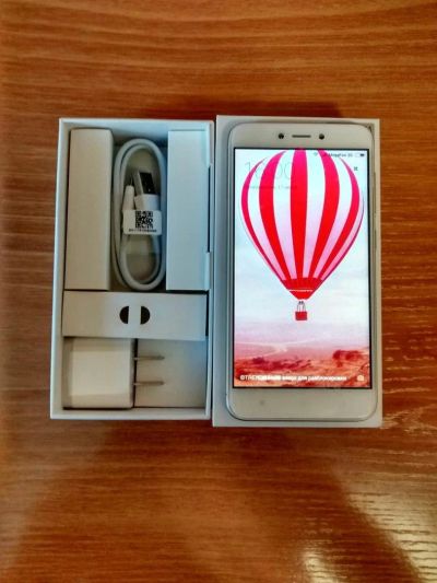 Лот: 10367747. Фото: 1. Xiaomi Redmi 4X 16Gb Gold - новый... Смартфоны
