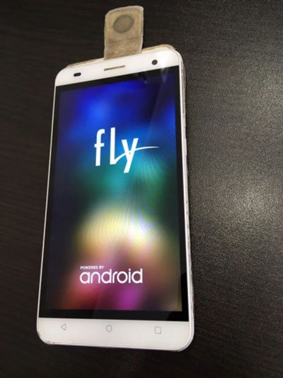 Лот: 11169500. Фото: 1. Смартфон Fly FS504 Cirrus 2. Смартфоны