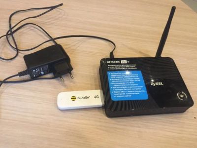 Лот: 24890106. Фото: 1. ZYXEL Keenetic 4G II с модемом... Беспроводные модемы