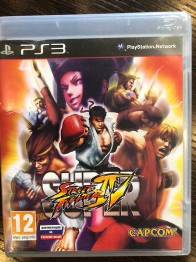 Лот: 12120165. Фото: 1. Super Street Fighter 4 игра для... Игры для консолей
