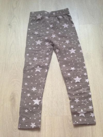 Лот: 7256128. Фото: 1. Легинсы со звездами (коричневые... Брюки, шорты, джинсы