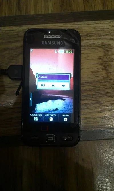 Лот: 9533520. Фото: 1. сотовый Samsung GT-S5233T с телевизором. Кнопочные мобильные телефоны