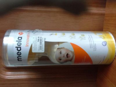 Лот: 6055432. Фото: 1. Бутылочка Medela Calma с соской... Всё для кормления