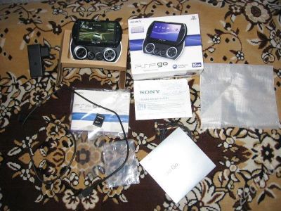 Лот: 195312. Фото: 1. продам оригинальную PSP GO Новую... Игровые приставки, консоли
