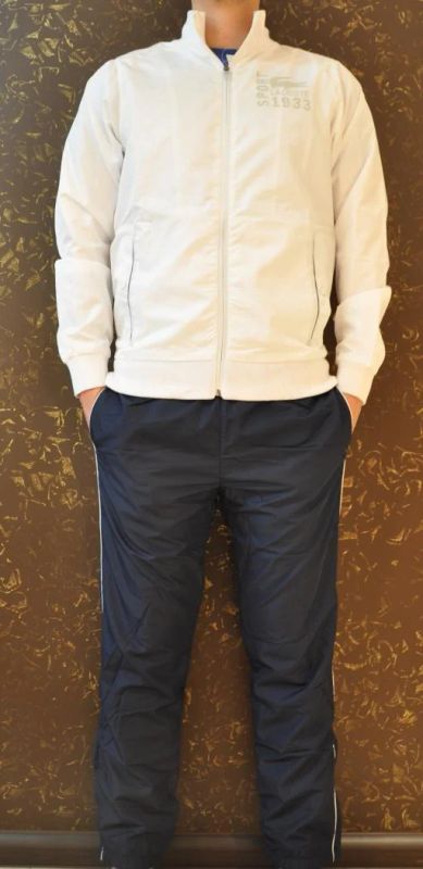 Лот: 8321823. Фото: 1. Спортивный костюм Lacoste бело... Спортивные костюмы