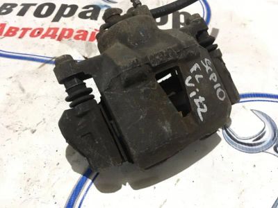 Лот: 21718637. Фото: 1. суппорт тормозной Toyota Vitz... Тормозная система