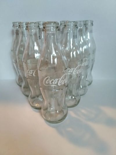 Лот: 19481379. Фото: 1. Пустые бутылочки от Coca-Cola... Контейнеры, банки