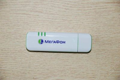 Лот: 2540405. Фото: 1. USB-модем HUAWEI E160G Мегафон. Другое (смартфоны, связь, навигация)