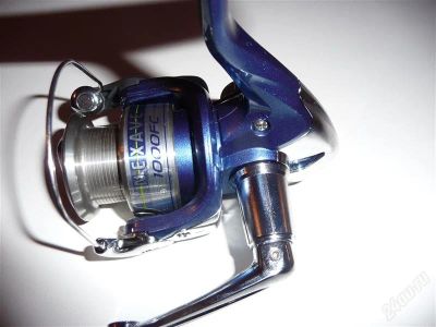 Лот: 1445429. Фото: 1. катушка Shimano NEXAVE 1000FC. Катушки, комплектующие