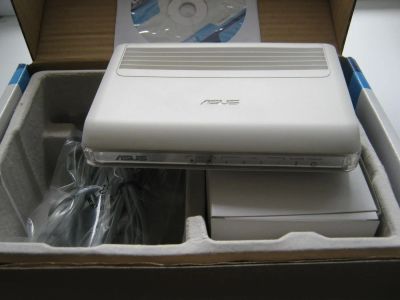 Лот: 7541110. Фото: 1. ADSL 2+ маршрутизатор со встроенным... Маршрутизаторы (роутеры)