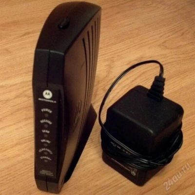 Лот: 1453761. Фото: 1. кабельный модем Motorola SB5101E. Проводные модемы