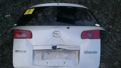 Лот: 11577634. Фото: 1. Дверь багажника Mazda demio 2003. Кузов