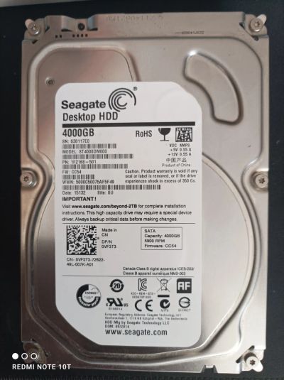 Лот: 25350088. Фото: 1. Жесткий диск ST4000DM000 №2. Жёсткие диски (HDD)