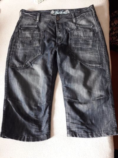 Лот: 12040409. Фото: 1. Новые джинсовые бриджи, от 47см... Брюки, шорты