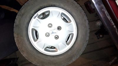 Лот: 5562812. Фото: 1. Комплект отличных зимних шин Bridgestone... Шины на дисках