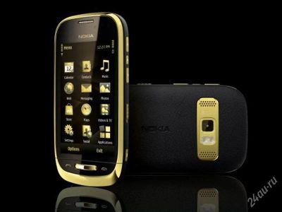 Лот: 1900976. Фото: 1. новый nokia oro gold dark + гарнитура... Кнопочные мобильные телефоны