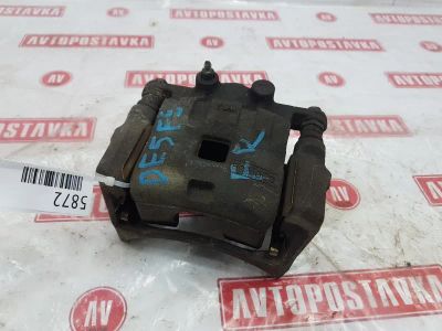 Лот: 20898611. Фото: 1. Суппорт тормозной Mazda Demio... Тормозная система