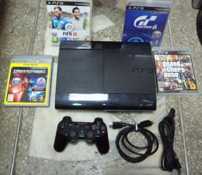 Лот: 8589515. Фото: 1. Sony PS3 500Gb + 8 дисков / 2... Консоли