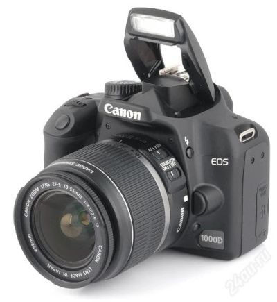 Лот: 1831497. Фото: 1. Canon EOS 1000D + китовый объектив. Цифровые зеркальные