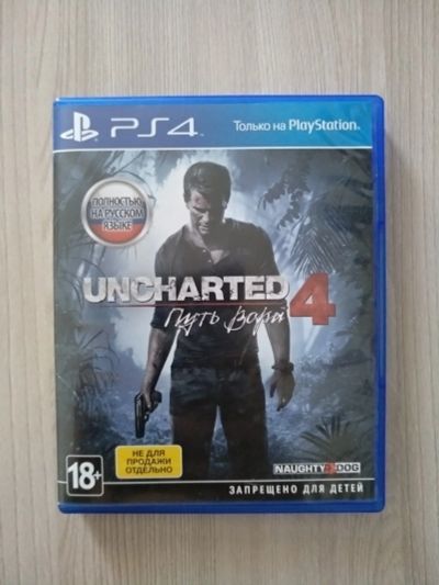 Лот: 14061775. Фото: 1. Uncharted 4: Путь Вора PS4. Игры для консолей