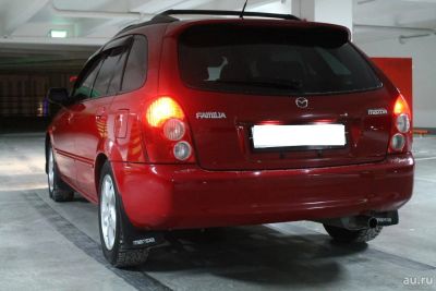 Лот: 9404089. Фото: 1. Бампер задний Mazda familia красный... Кузов