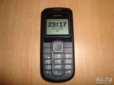 Лот: 8120379. Фото: 1. Nokia 1202 рабочий, см описание. Кнопочные мобильные телефоны
