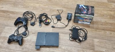 Лот: 25316381. Фото: 1. Приставка Sony playstation 2. Игры для консолей