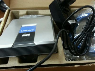 Лот: 7441376. Фото: 1. Linksys SPA2102 Адаптер для VoIP-телефонии. Другое (сетевые устройства)