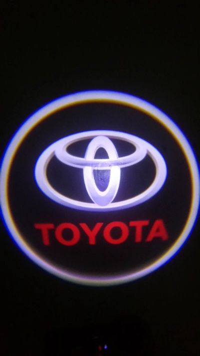 Лот: 11977755. Фото: 1. Лазерная проекция логотипов Toyota... Детали тюнинга