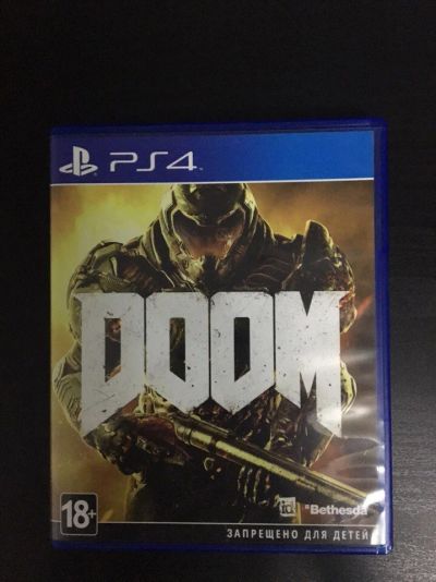 Лот: 10554471. Фото: 1. Doom PS4. Игры для консолей